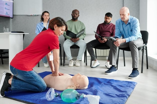 A diverse group of community members participates in a first-aid training session, carefully listening to an instructor, suggesting a commitment to local preparedness and collective action.
