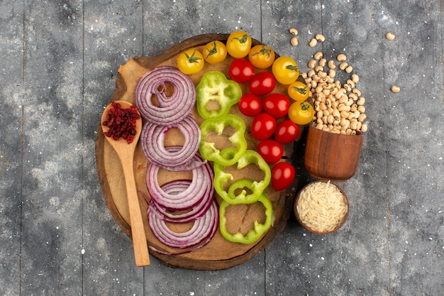 A colorful, well-arranged plate of healthy food including fresh vegetables, lean protein, and whole grains, against a clean kitchen background.