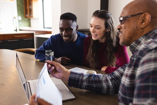 A diverse group of people sitting around a table, discussing investment options on a laptop and physical documents, symbolizing real estate crowdfunding or partnership.