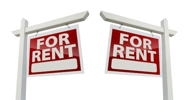 A clean and well-maintained apartment building exterior, with a 