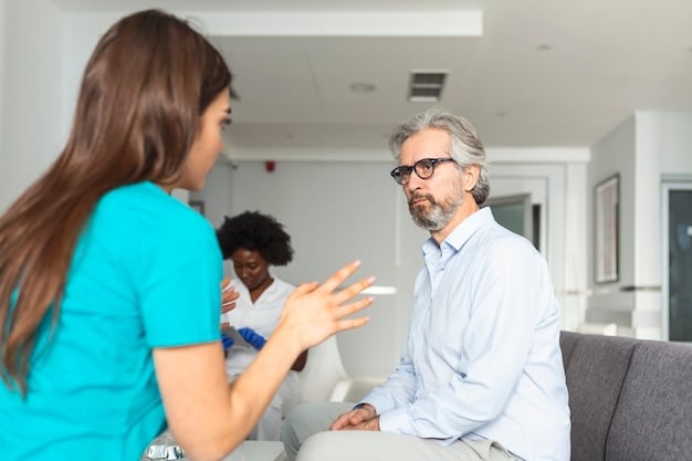 A healthcare professional speaking empathetically with a patient in a clinic setting, symbolizing accessible and comprehensive health discussions.