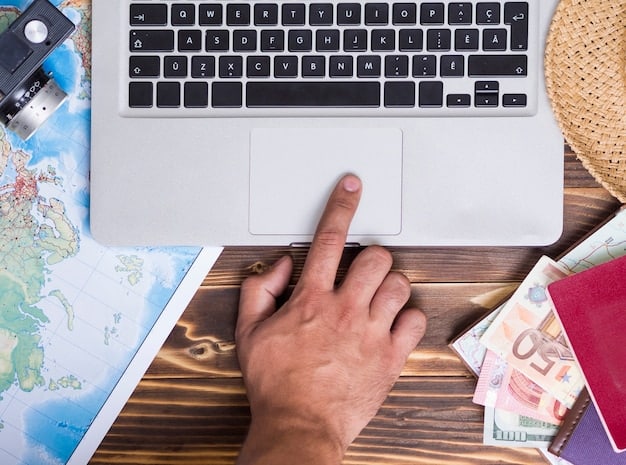 A detailed shot of hands working on a laptop, with financial aid forms and a calculator alongside, representing the meticulous process of financial planning for education. The scene is calm and focused.