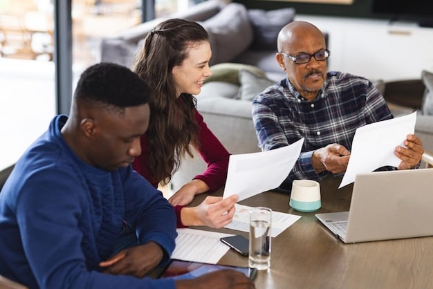 A diverse group of people filling out tax forms on laptops and paper, with friendly advisors nearby, highlighting community support and accessibility to tax preparation.