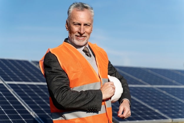 A farmer smiling while standing in front of a newly installed solar panel array on their barn, surrounded by a green field under a clear blue sky, illustrating sustainable energy adoption in rural America.